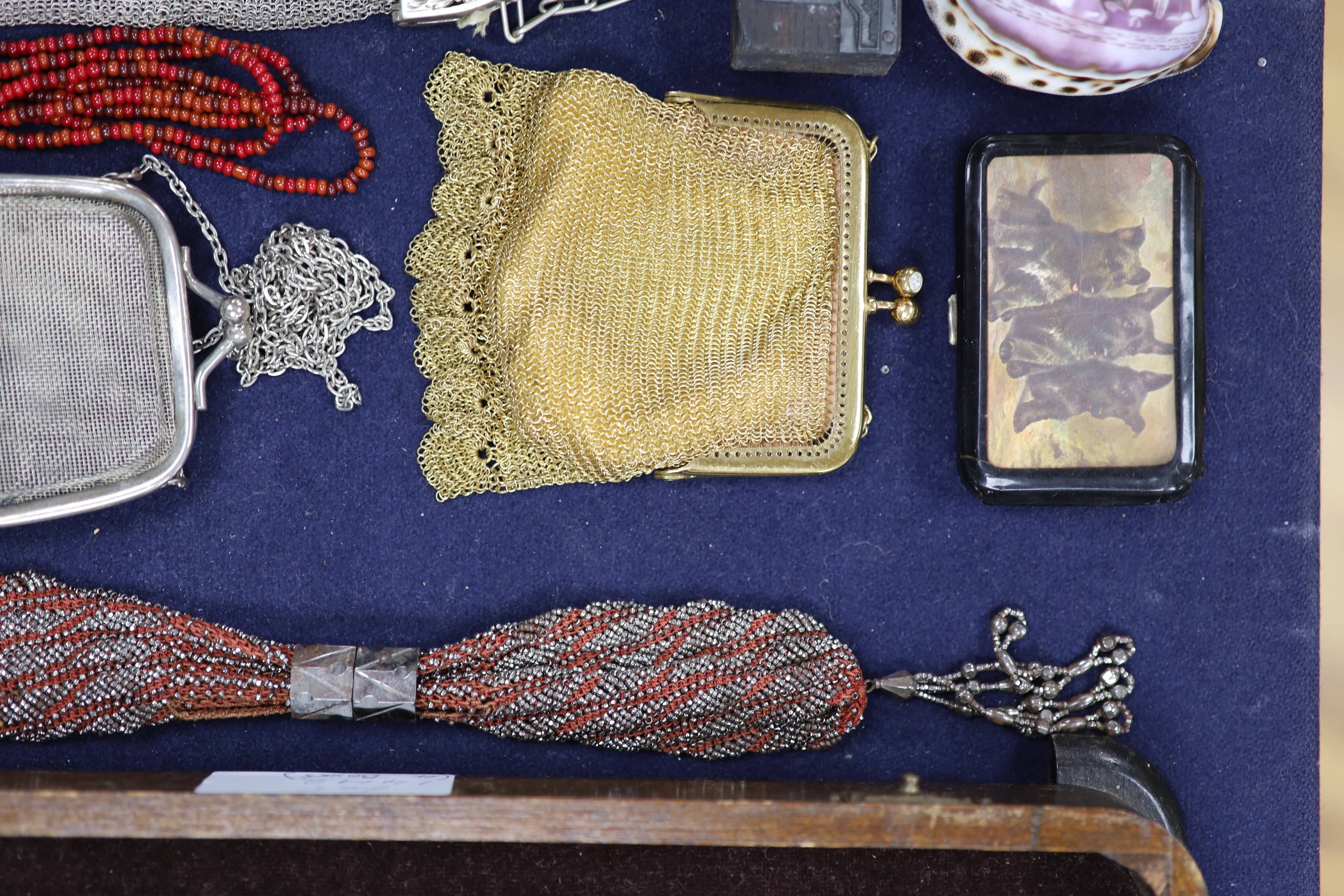 A collection of approximately fifty Victorian and later beadwork, white metal and fabric purses etc.